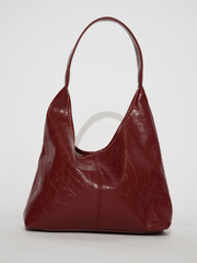 Scarlett distressed faux-leather handbag