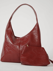 Scarlett distressed faux-leather handbag