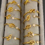 BAGUE INITIALE